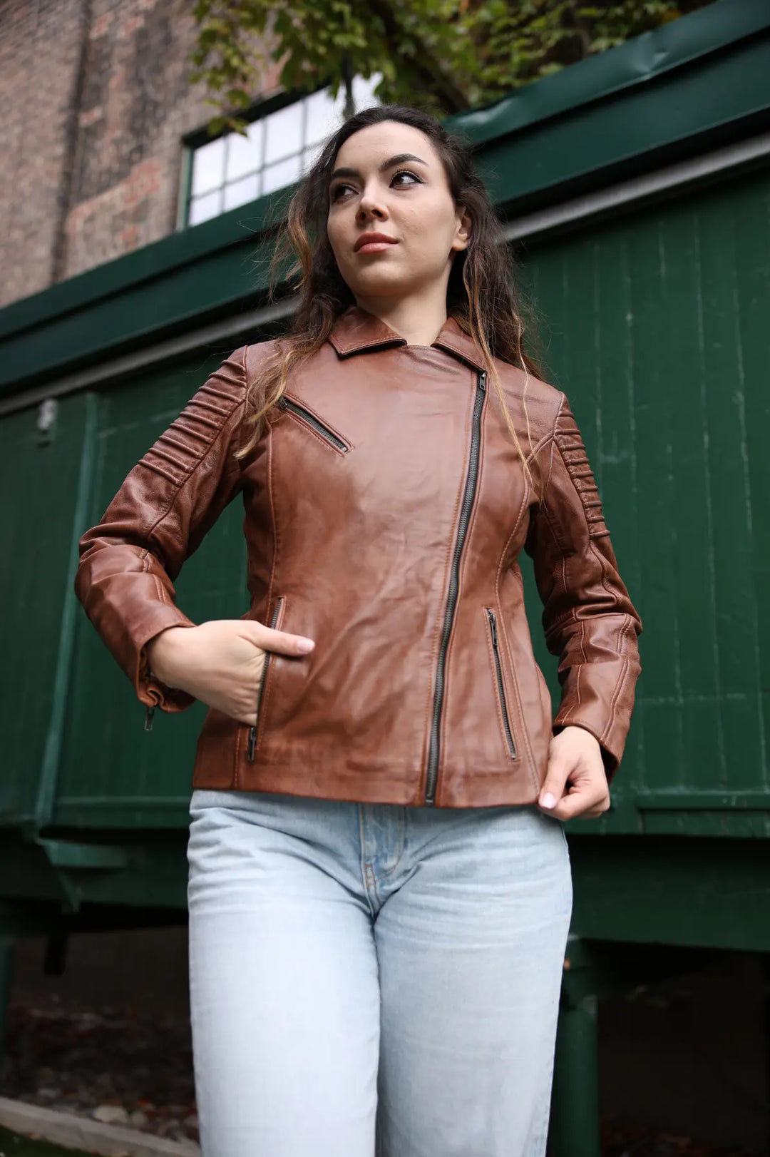 Women's distressed biker leather jacket with piping