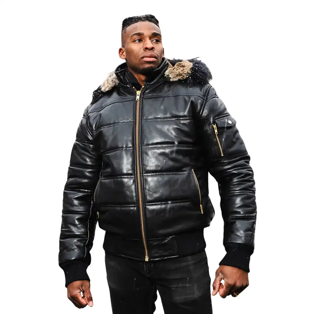 A model wearing the Ash hooded leather puffer jacket with a streetwear outfit, showcasing the urban aesthetic and mid-weight volume.