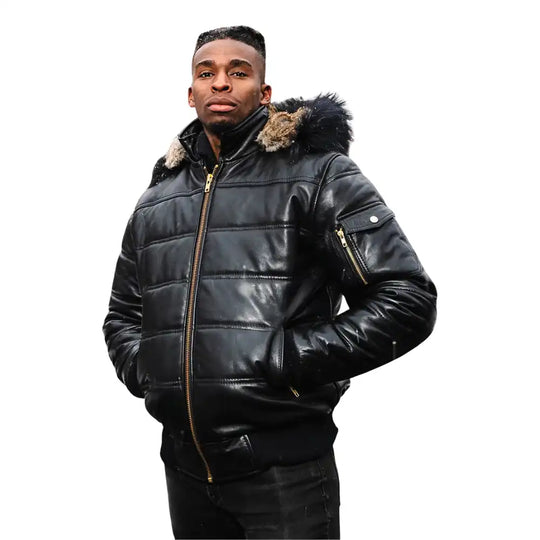 A model wearing the Ash hooded leather puffer jacket with a streetwear outfit, showcasing the urban aesthetic and mid-weight volume.