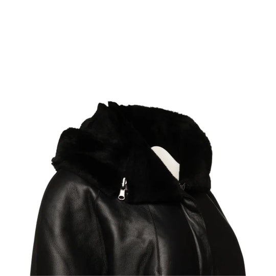 Upper side Close-up of the Avalon Black oversized reversible sheepskin long coat, featuring high-quality stitching, a plush collar