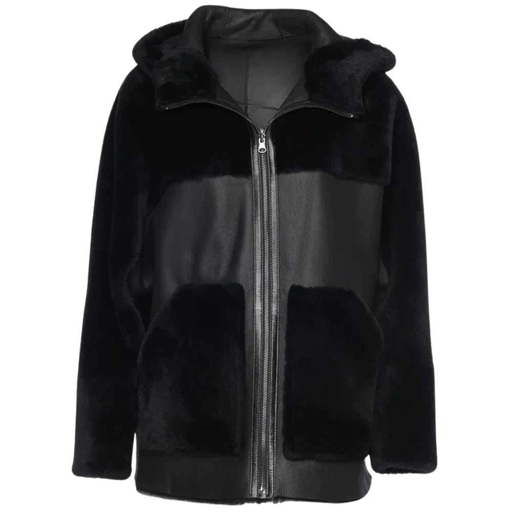 Front view of the Elena oversized jacket showing the smooth black leather exterior with plush shearling trim on the collar and cuffs.