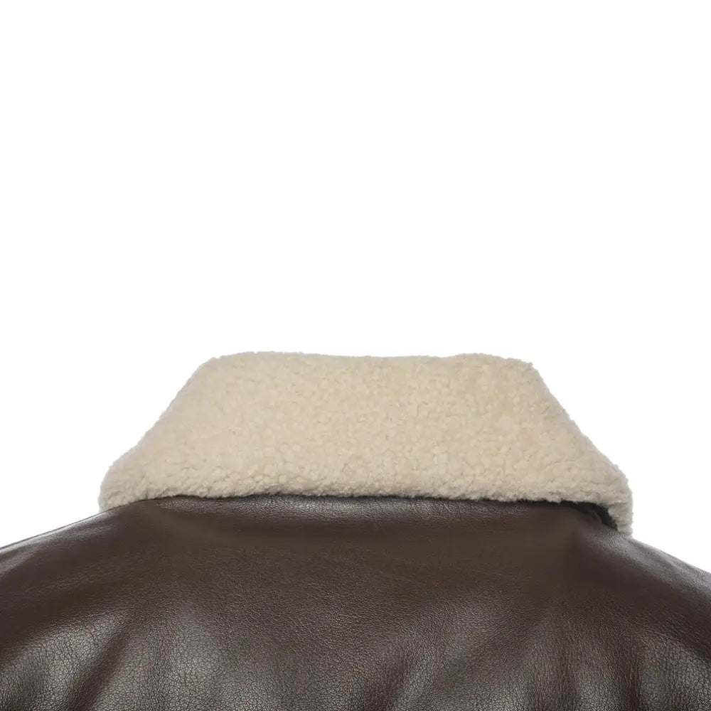 Close-up shot showcasing the rich shearling collar of the Henri Brown A2 Bomber Leather Jacket, emphasizing its premium quality.