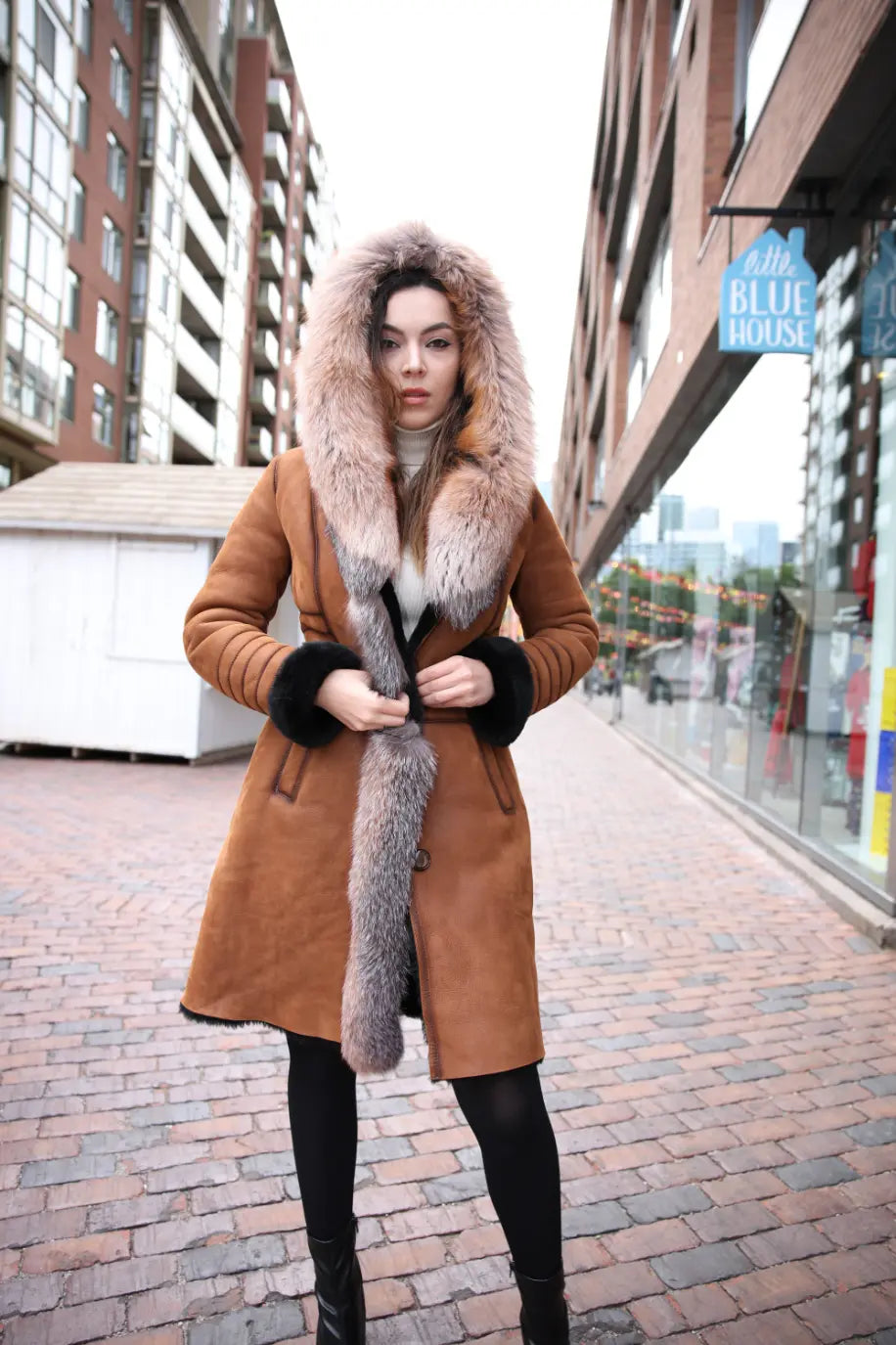 Chantal's Tan Shearling coat with large fox fur hoodie and trim