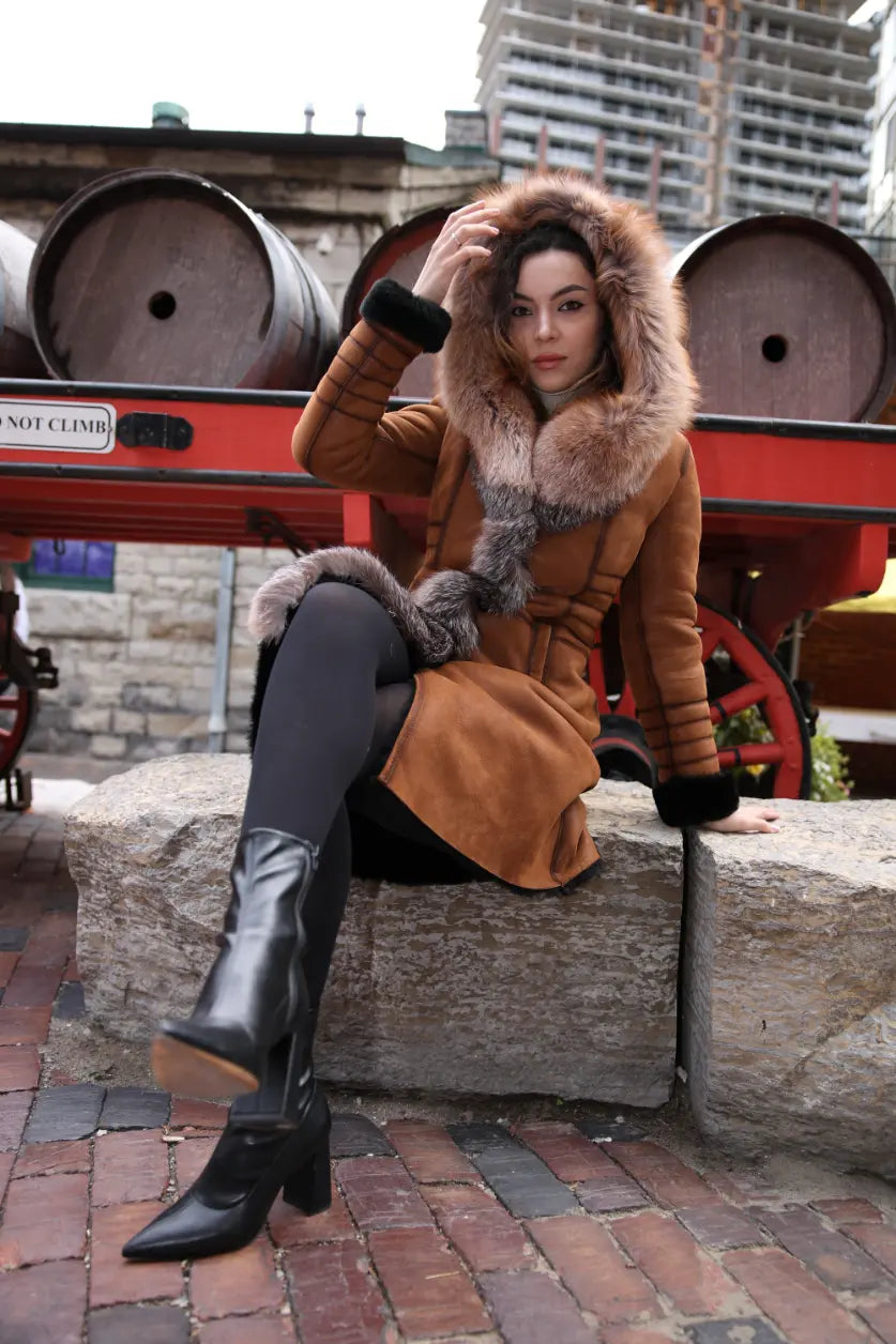 Chantal's Tan Shearling coat with large fox fur hoodie and trim