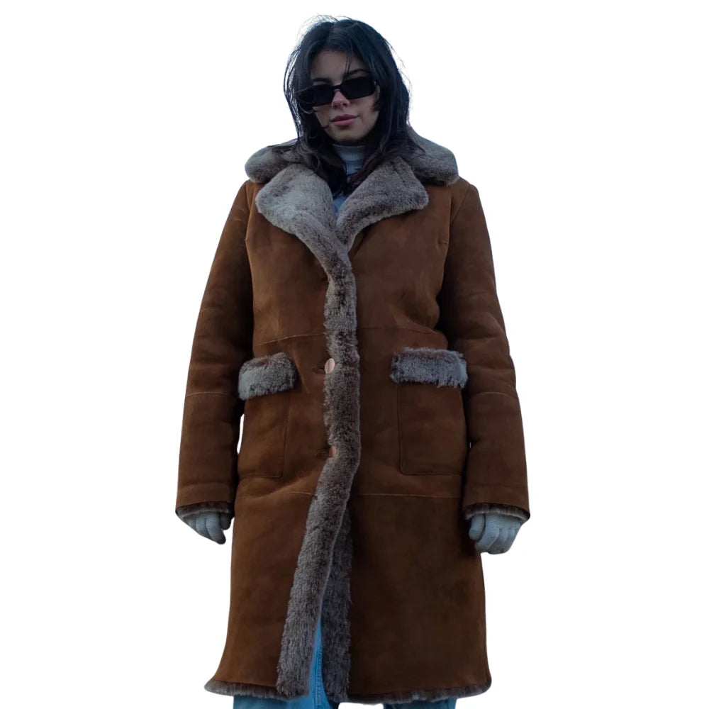 Model wearing the Sabina Tobacco oversized long shearling coat, styled for a chic, winter-ready look.