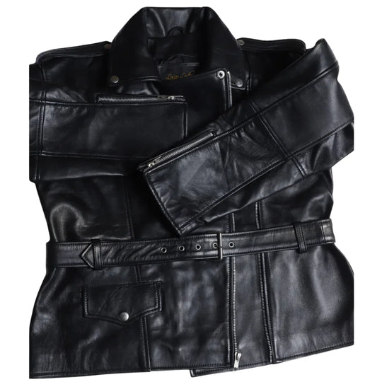 Close-up of the Zelora biker jacket’s silver hardware, including zippered pockets and metal snaps on premium black grain leather, without model.