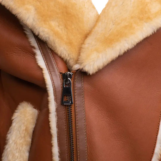 Asymmetrical Zippered and shearling lapel front detail of Alek's Biker Shearling Jacket, designed for a customizable fit and added style.