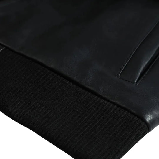 Black Bomber Style Ribbed Jacket front leather texture detail with ribbed waistband