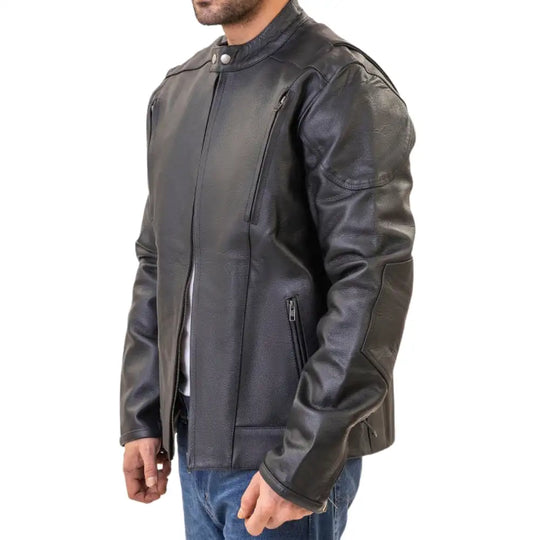 A model leaning against a modern classic motorcycle, wearing the Carson jacket to demonstrate its sharp, versatile silhouette.
