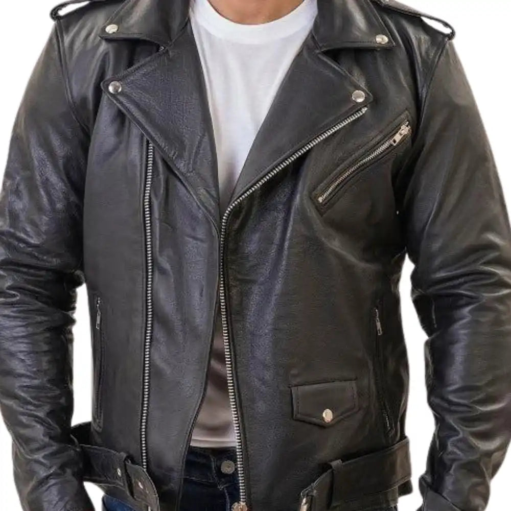 A close up of the model wearing the armored leather motorcycle jacket, demonstrating the structured, protective fit and classic cafe racer aesthetic.