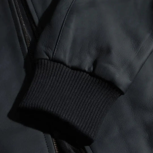 Colt Matte Black Ribbed Bomber Jacket close up of ribbed cuff on leather sleeve