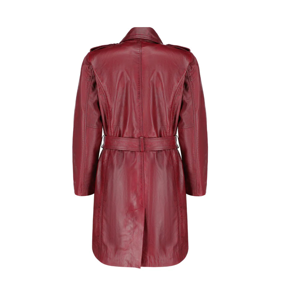 Back view of the coral red leather coat highlighting the structured shoulders and the adjustable leather belt.