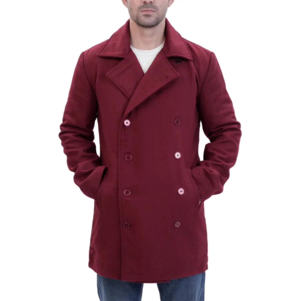 burgundy wool overcoat worn by a person hands in pocket on a white background