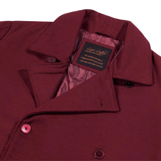 Close-up of the notch lapels and structured shoulder of the Dorian Burgundy Wool Overcoat, white background.
