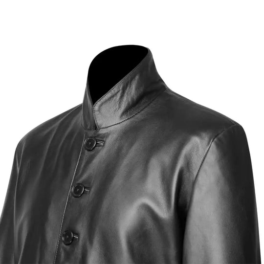 Macro shot of the shoulder and top buttons with smooth leather finish on the Gilbert black longline coat.