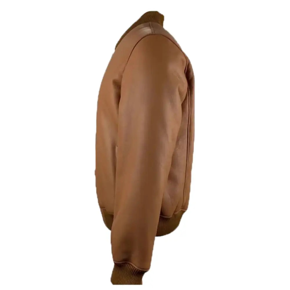 Side profile of the Jonathan Tan shearling bomber jacket, highlighting its sleek silhouette, ribbed cuffs, and waistband, with a zipper closure.