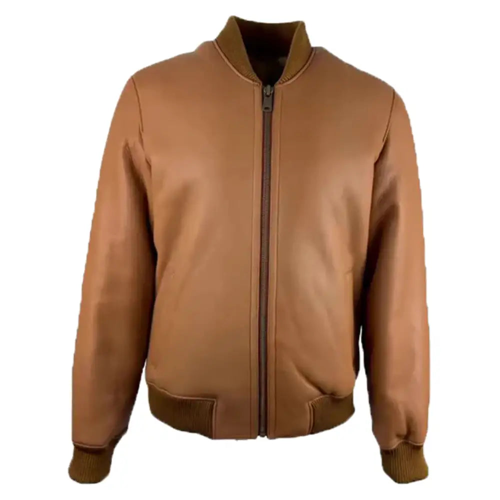 Front view of the Jonathan Tan shearling bomber jacket, showcasing its tan leather with ribbed cuffs and waistband, zipper closure, and a simple design.