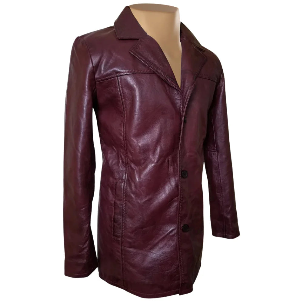 Side profile of Krueger's maroon leather blazer highlighting the slim-cut sleeves, structured shoulders, and the depth of the flap pockets.