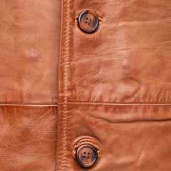 Logan English Tan Leather Trench Coat close up button closure on leather trench coat