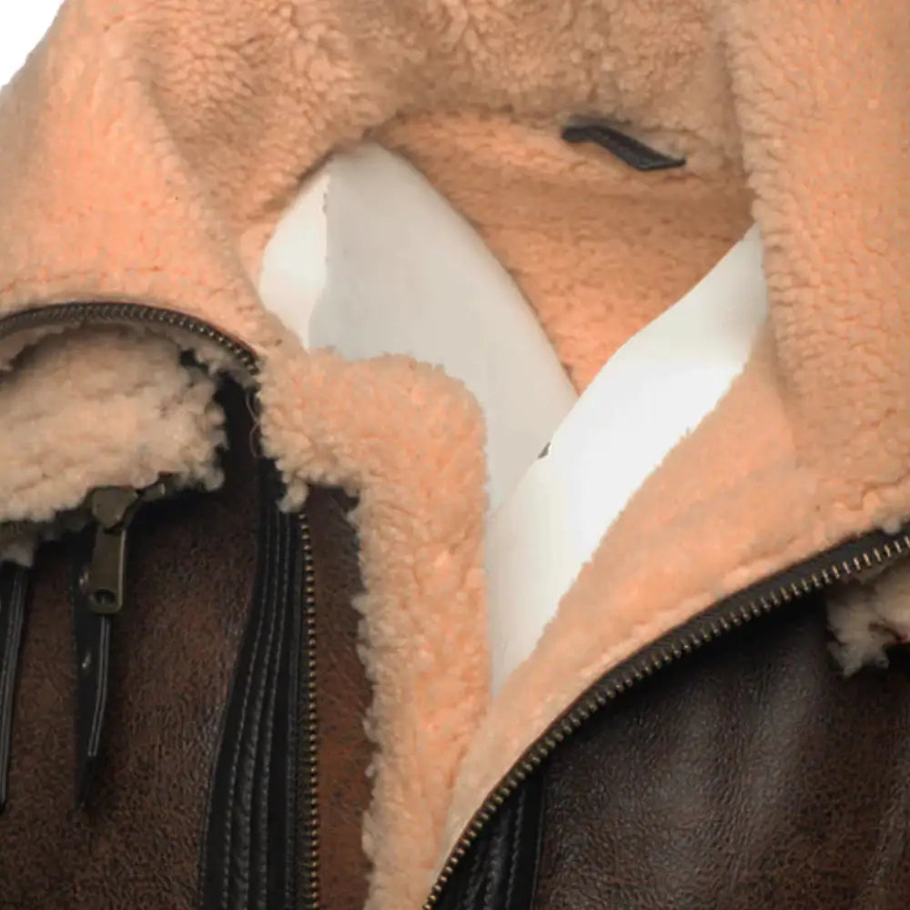 Detailed view of the luxurious cream shearling lining around the collar of Richard's Vintage Distressed Brown Aviator Bomber Shearling Jacket.