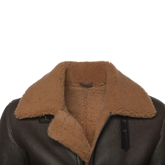 Close-up of the shearling collar and strap detailing on the Rob Brown B3 Bomber Jacket. The tan shearling collar is fastened with leather straps for a snug fit.