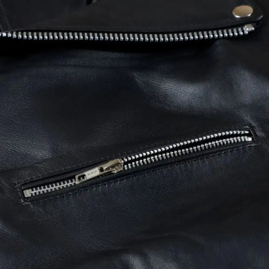 Zipper Close-up shot of the fine-grain leather and precision stitching that defines the Slim Fit Belted Leather Biker Jacket and its high-quality hardware.