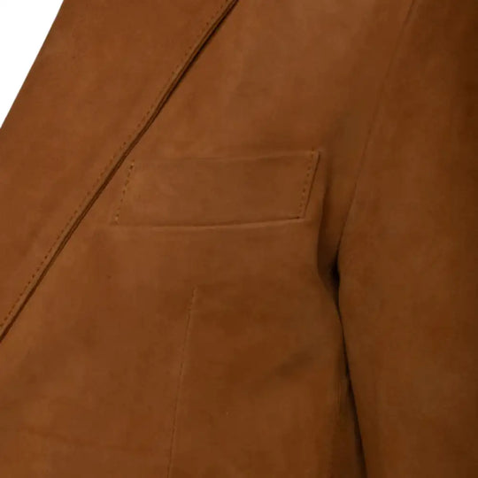 Close-up of a Wyatt tan suede leather blazer with pocket details on a white background
